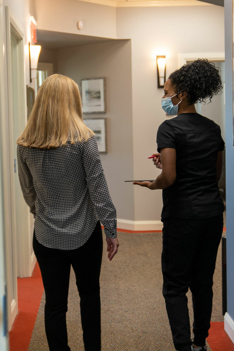 walking down the hallway at stoneridge dental